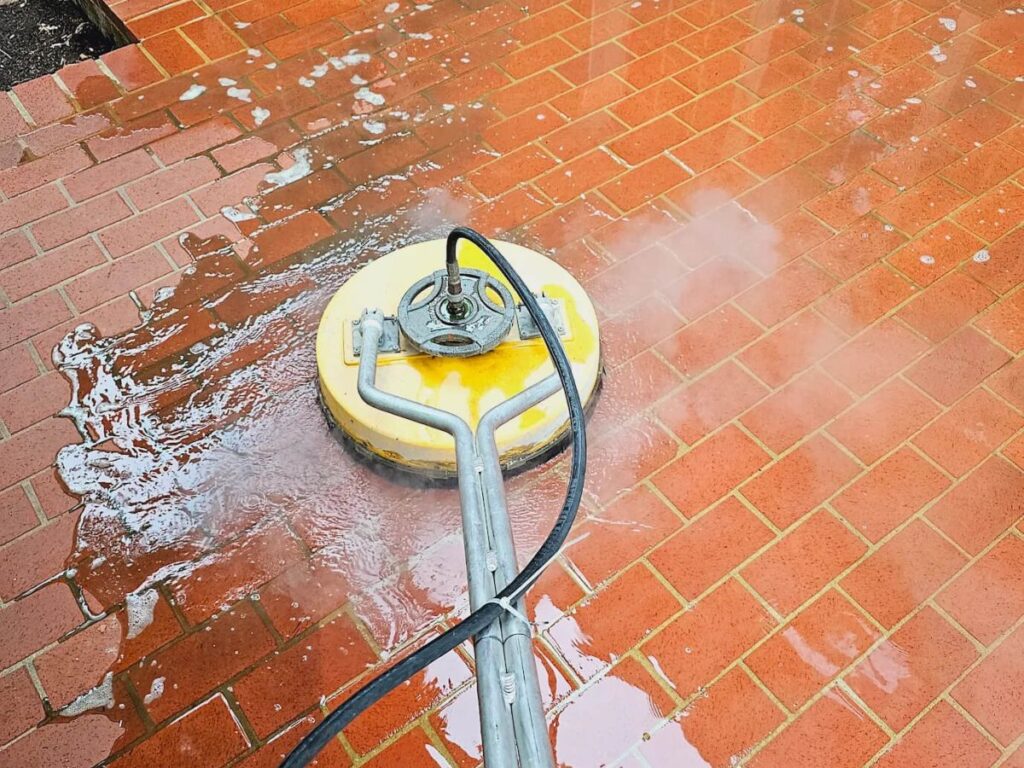 Pressure washing brick pavers